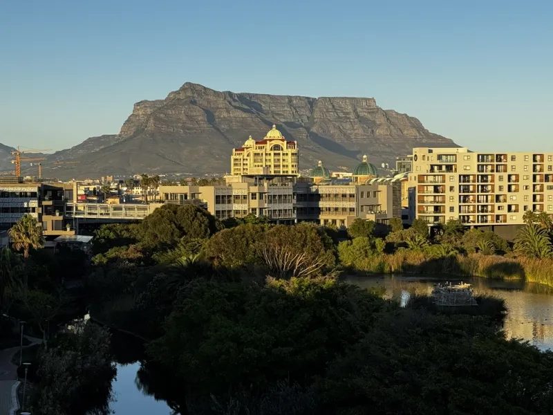 Century City in Cape Town at sunrise, with the Canal Walk domes and Table Mountain behind